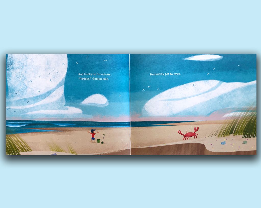 Book pages with sand and open area. 'Day At The Beach' Building a Sand Castle