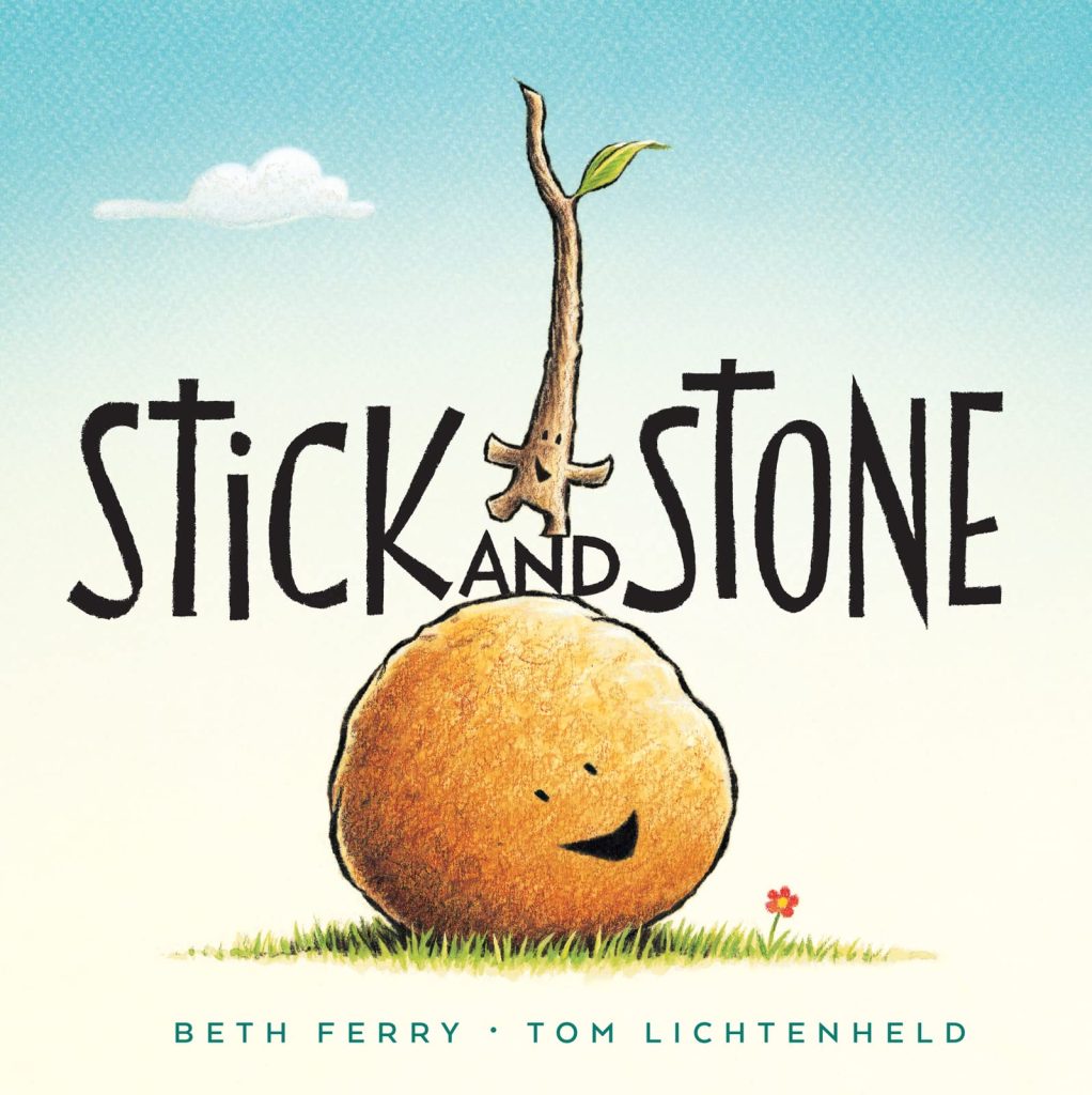 16 Meaningful Anti-Bullying Books to Develop Kindness and Empathy. Book cover stick standing on stone.